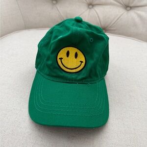 Green Cap with Yellow Smiley Face